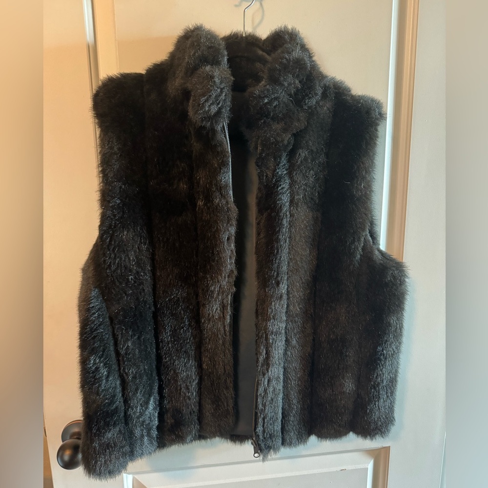Faux fur reversible vest.
